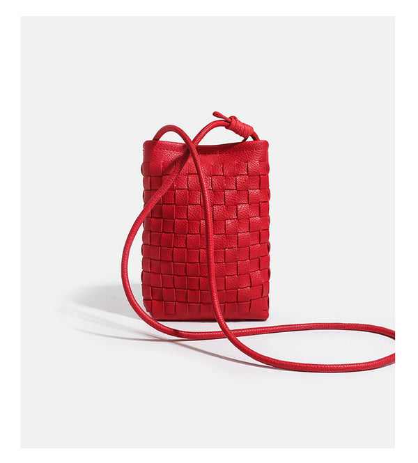 Mini woven square-pattern crossbody phone bag with long cord strap and front snap flap pocket in red textured leather-look