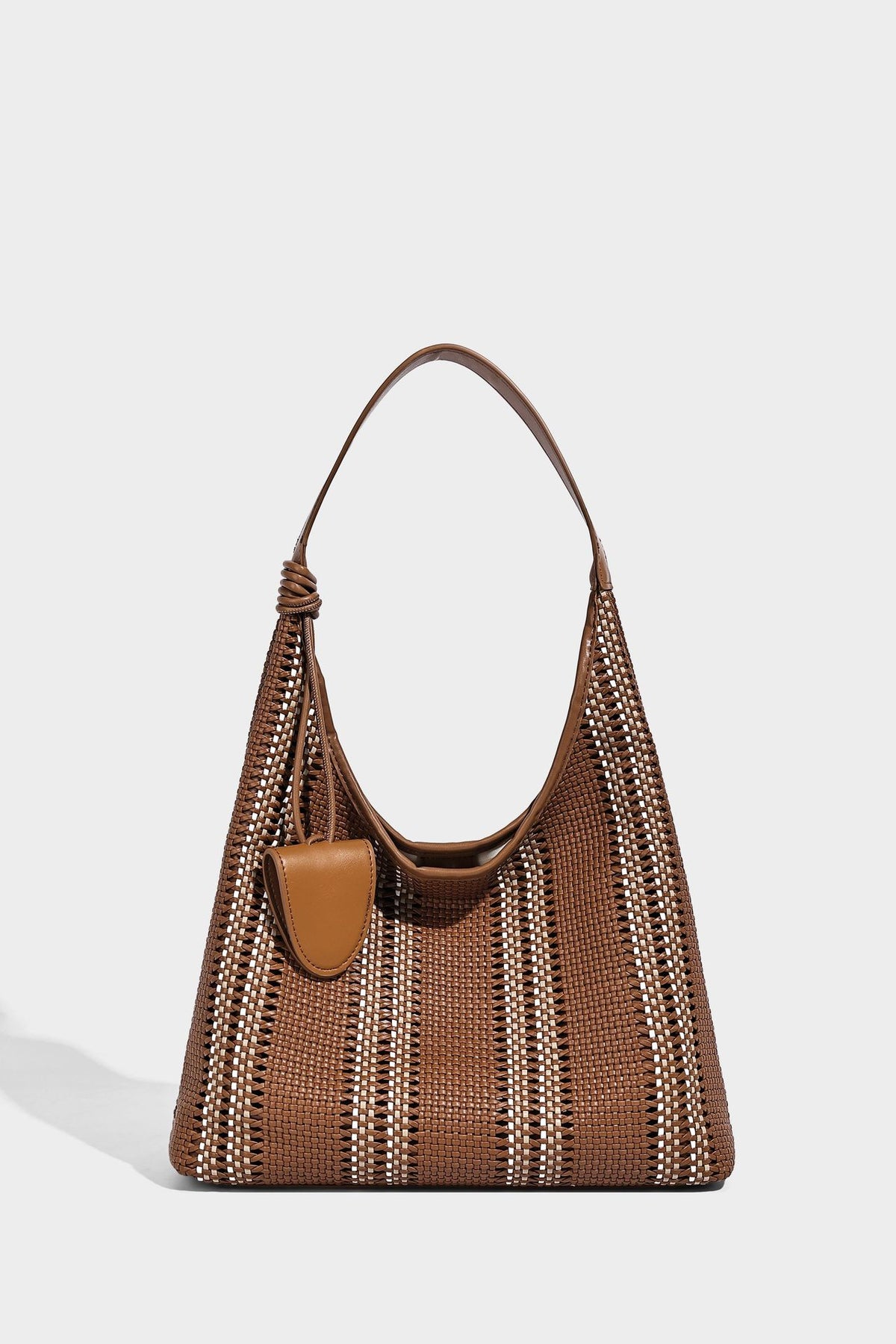 Woven striped slouch shoulder tote bag with knotted strap and attached front flap pouch, detail view 21