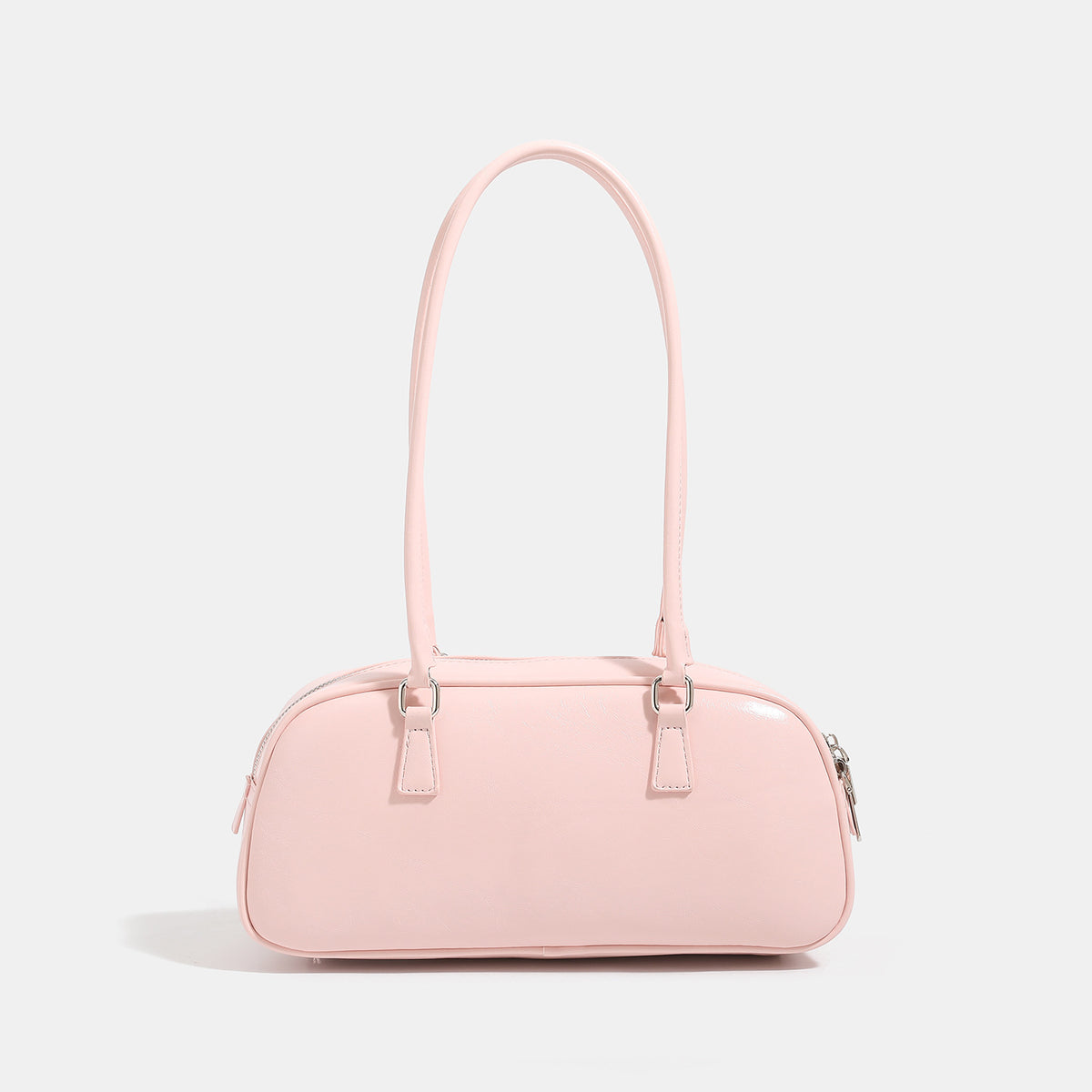 Rounded baguette shoulder bag with glossy leather-look finish, double-pull zip top, dual top handles, and silver-tone, detail