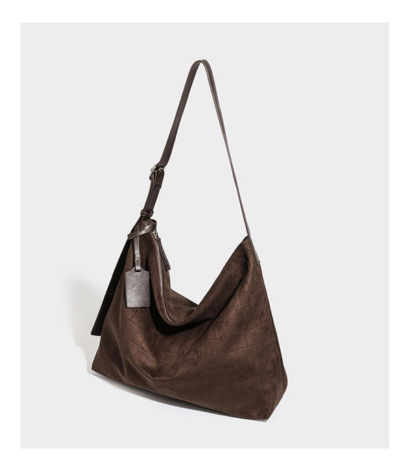 Slouchy croc-embossed matte hobo shoulder bag with adjustable strap and top zip closure, detail view 15