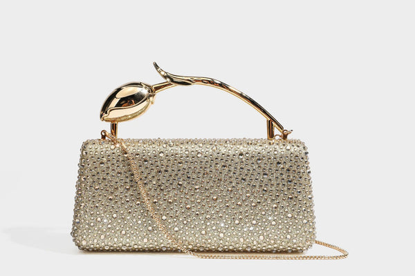 rectangular hard-case rhinestone evening clutch with sculptural gold-tone branch-and-bud top handle and detachable chain