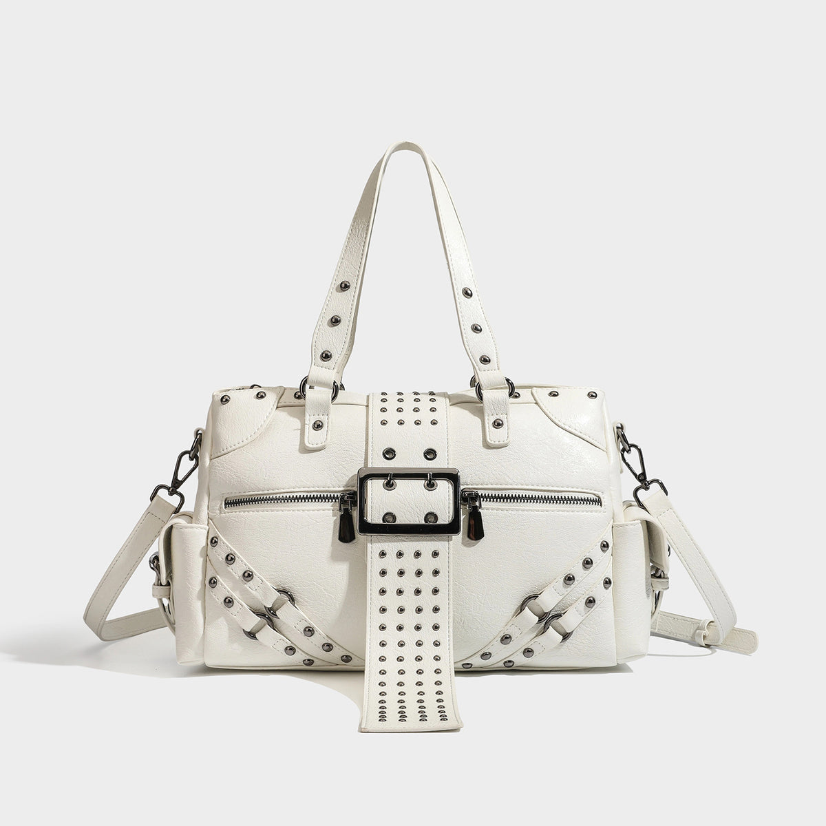 Structured pink leather-look satchel bag with gunmetal studded trim, rectangular buckle strap, dual top handles, and, front