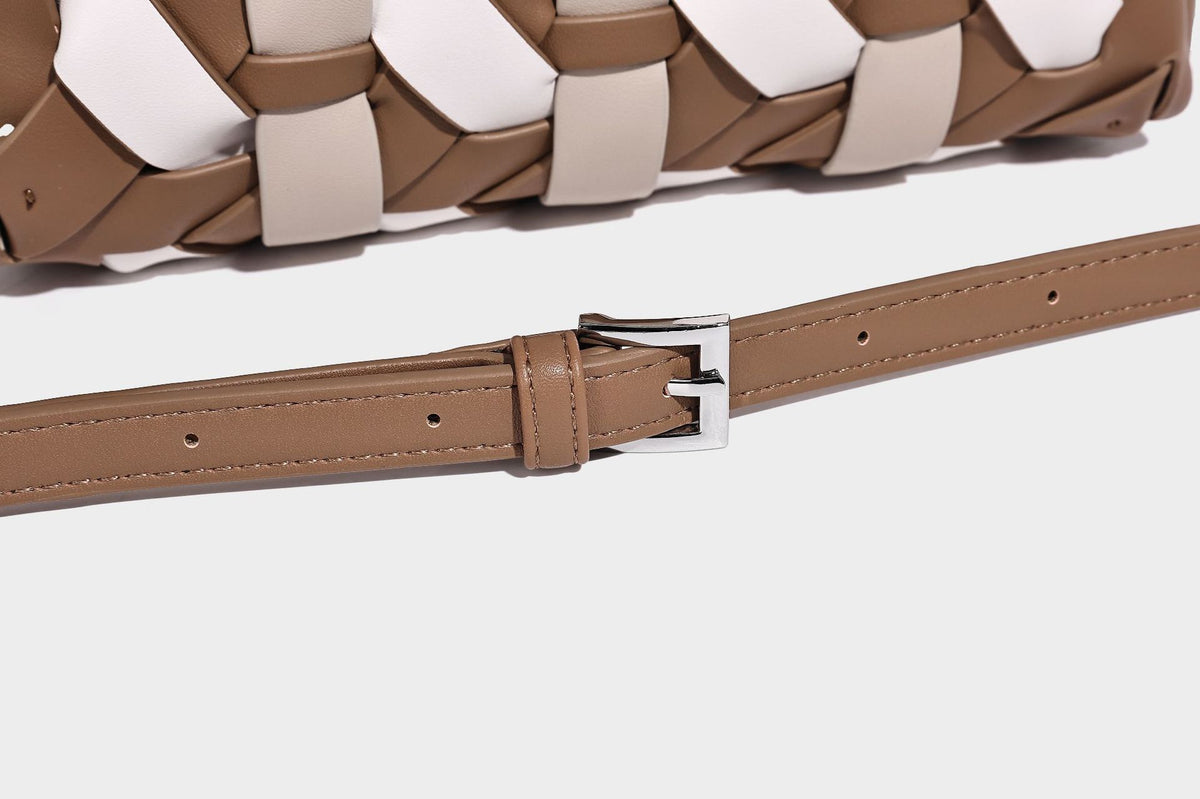 Small structured satchel bag with two-tone woven front panel, dual top handles, and detachable crossbody strap in tan brown