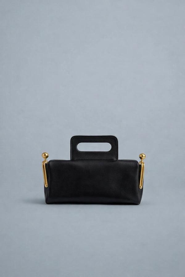 Kompakte dunkelbraune Henkeltasche in Lederoptik mit goldfarbenem Rahmenbeschlag und abnehmbarem, verstellbarem Crossbody-Riemen
