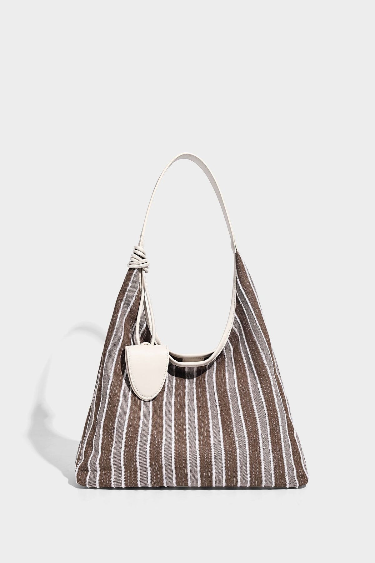 Slouchy striped canvas hobo shoulder bag with cream trim and long knotted strap, detail view 8