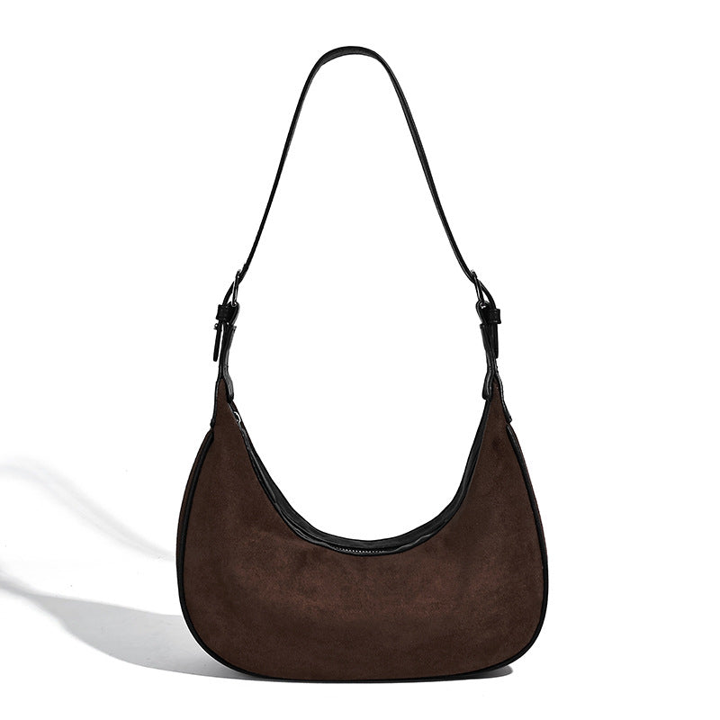 Crescent hobo shoulder bag in matte suede-look finish with black trim and adjustable strap, detail view 5