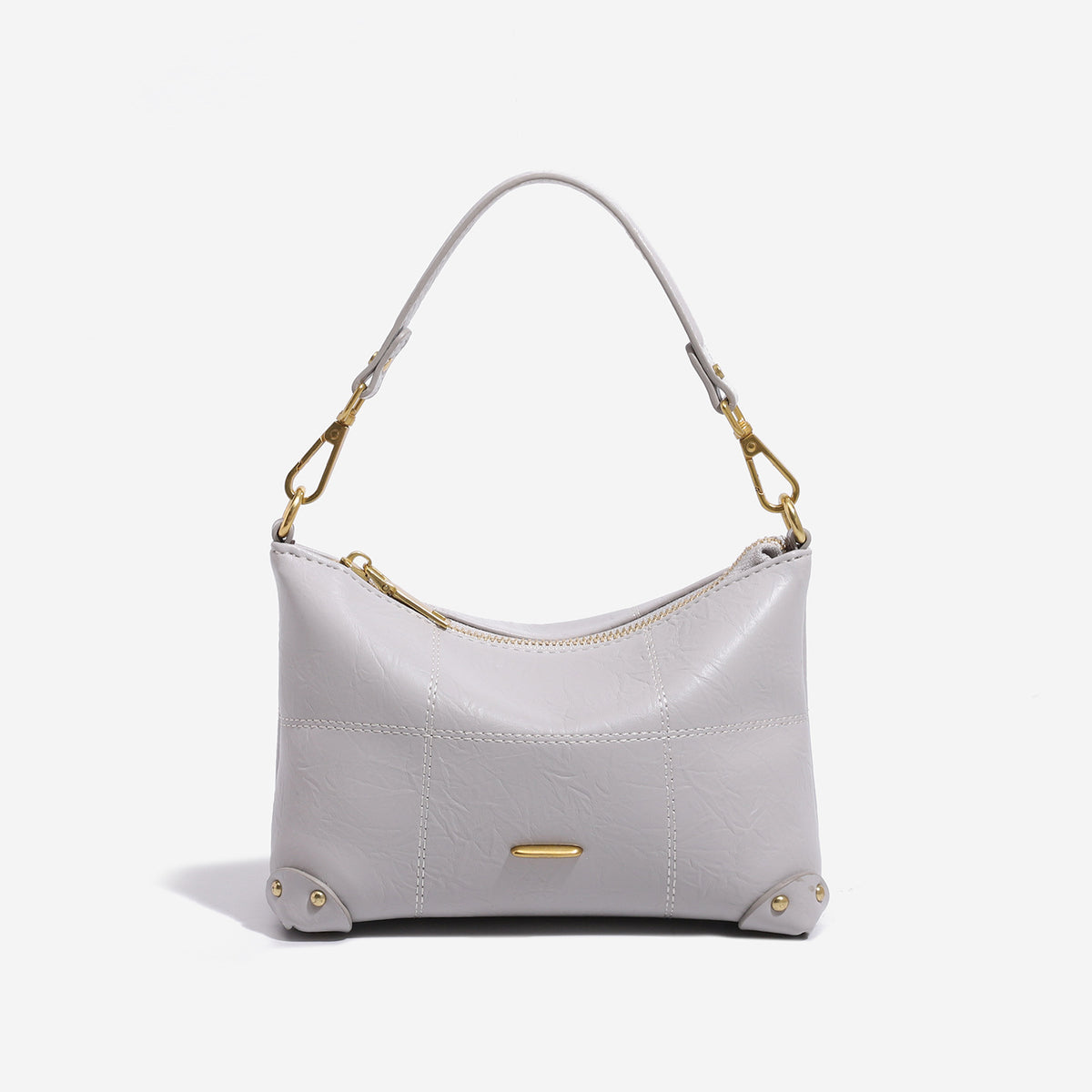 Kleine weich strukturierte Schultertasche mit geschwungenem Reißverschluss, abgesteppten Partien und goldfarbenen Metalldetails, Vorderansicht