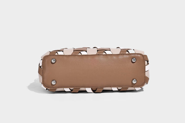 Small structured woven lattice tote bag with dual top handles and detachable shoulder strap in brown and cream leather-look