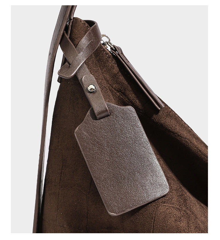 Slouchy croc-embossed matte hobo shoulder bag with adjustable strap and top zip closure, detail view 19