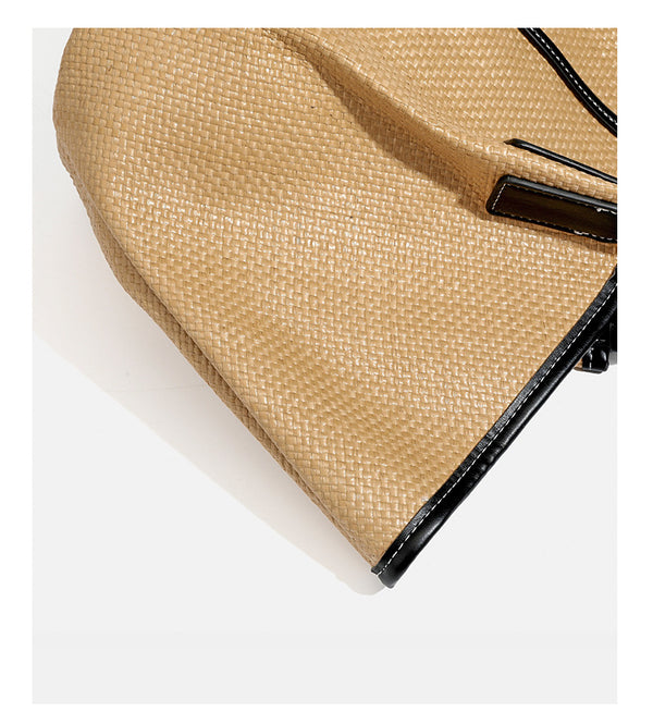 Tan woven tote bag with contrasting leather-look trim, long shoulder straps, and detachable rectangular zip pouch, detail