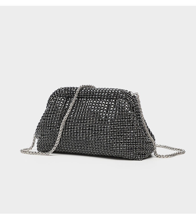 Small crystal rhinestone clutch crossbody bag with silver-tone chain strap and frame-clip closure, detail view 19