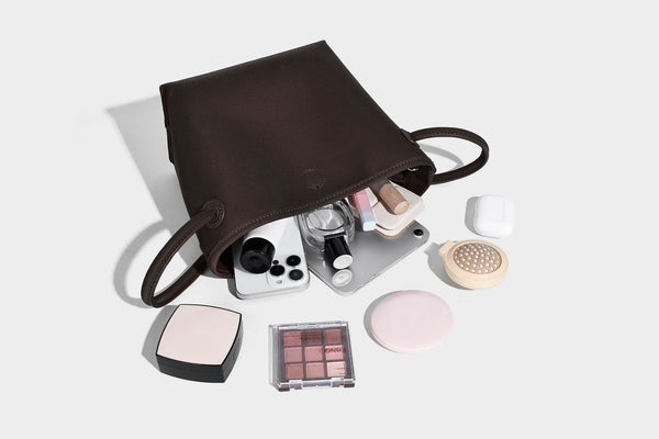 Small structured matte pebbled tote bag with twin top handles and removable zip pouch, detail view 25