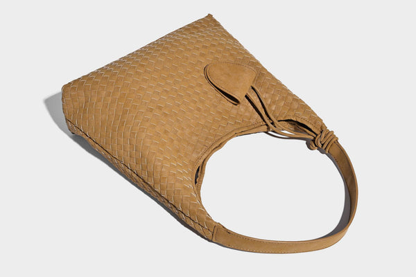 Slouchy woven hobo shoulder bag with knotted strap and matte leather-look textured finish, detail view 22