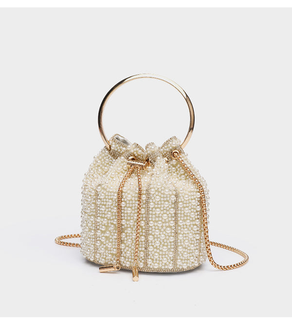 Small pearl-beaded drawstring bucket bag with silver-tone ring top handle and chain shoulder strap, detail view 19