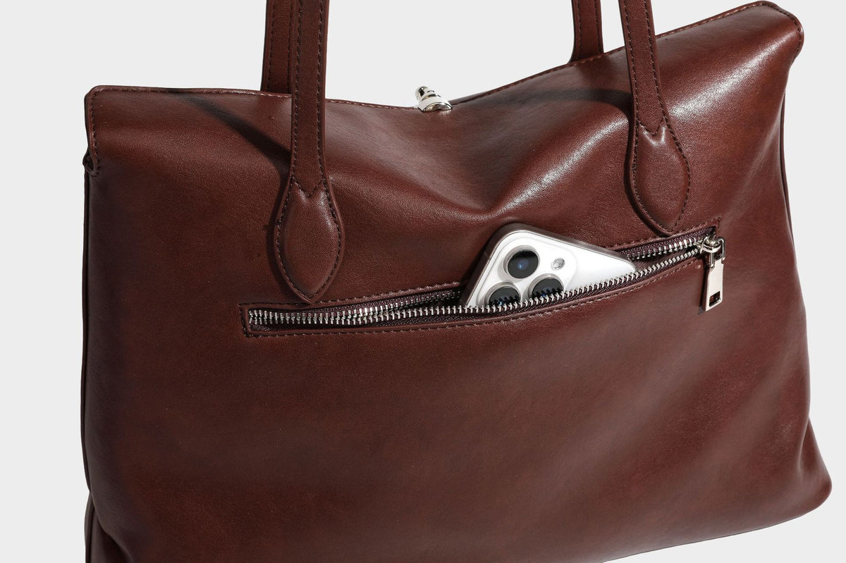 Large leather-look tote shoulder bag with slim double straps and silver-tone turn-lock closure, detail view 31
