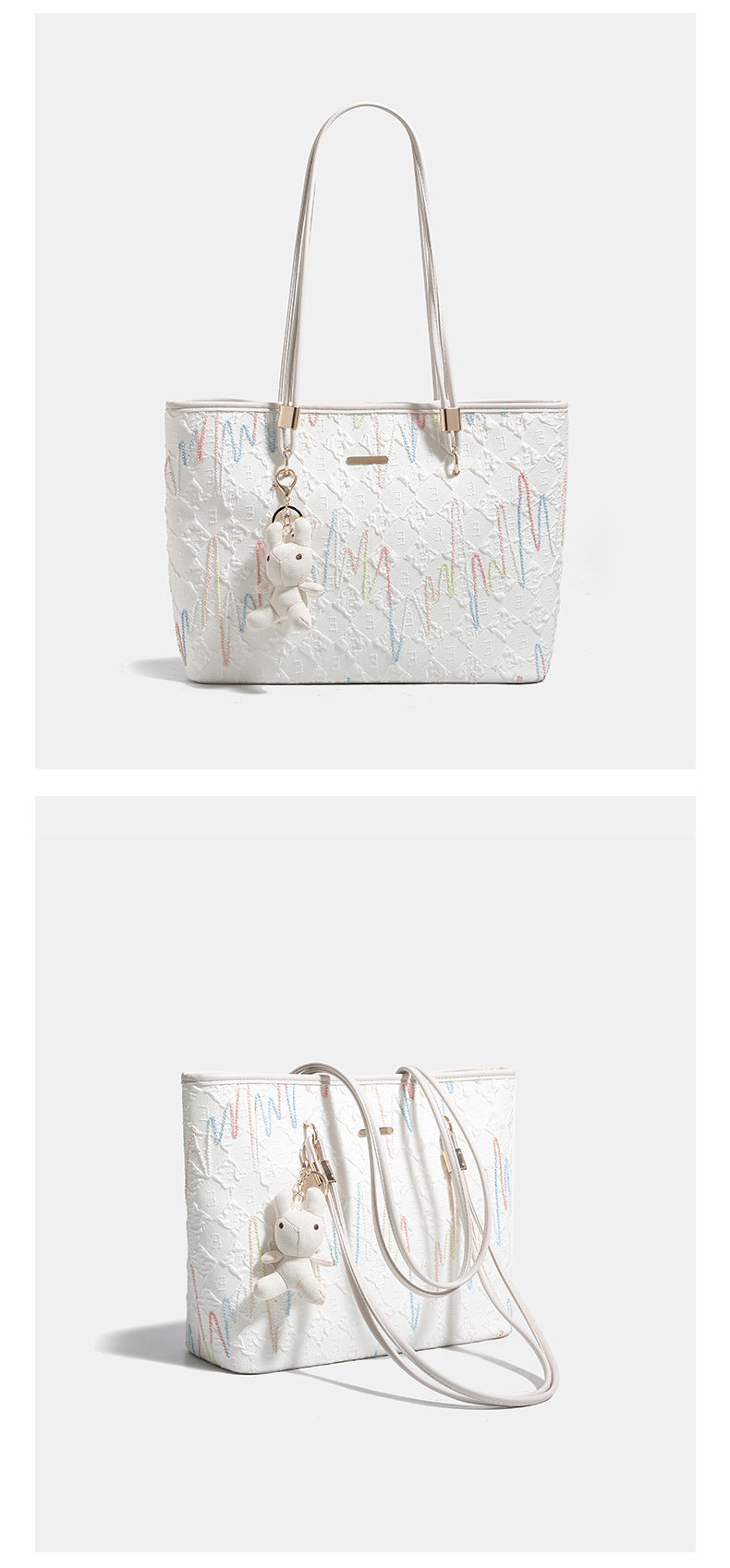 Off-white structured tote bag with dual shoulder straps, gold-tone hardware, and plush bear charm, detail view 10