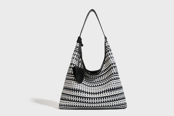 Slouchy woven stripe hobo shoulder bag with black-and-white pattern and leather-look strap, detail view 22