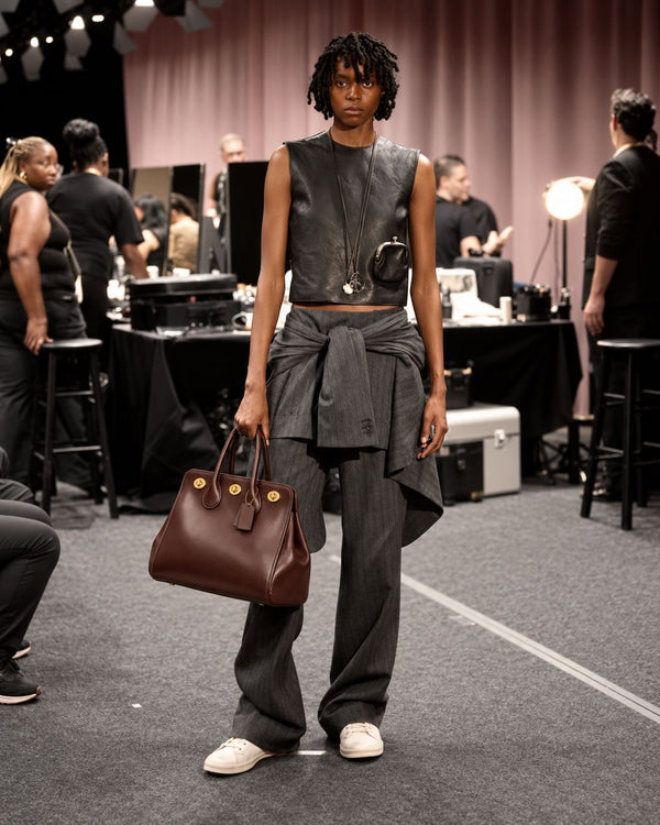 Structured leather-look tote bag with three gold-tone turn-lock closures and double rolled top handles, detail view 12