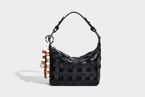 Small woven convertible shoulder bag with top zipper, silver-tone hardware, and detachable crossbody strap, detail view 22