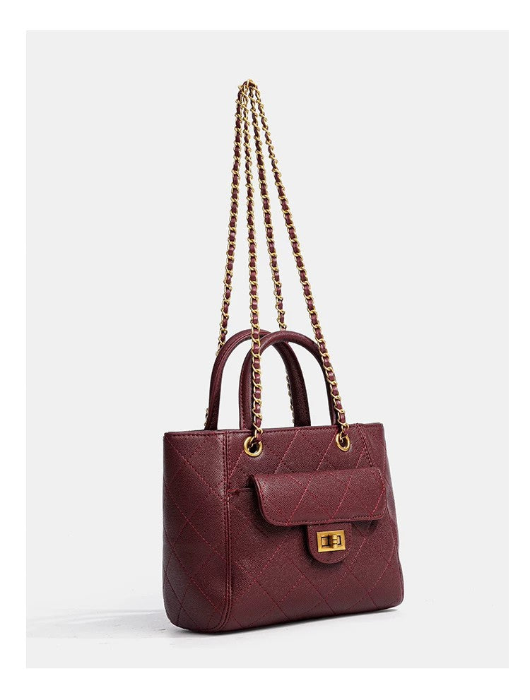 Diamond-quilted leather-look shoulder tote bag with gold-tone chain strap and dual top handles, detail view 15