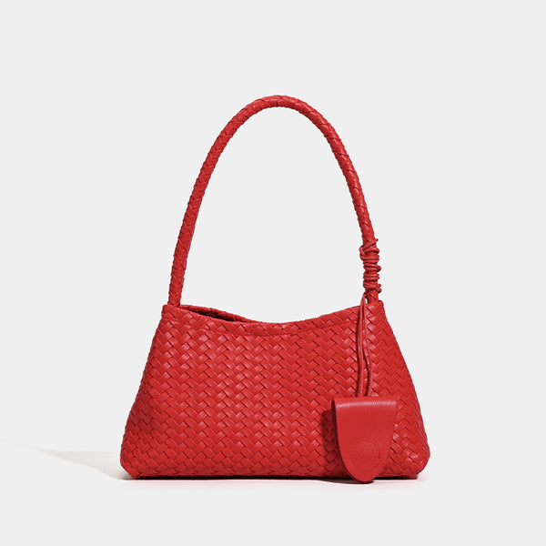 Woven leather-look shoulder bag with braided strap, trapezoidal body, and matching zip pouch, detail view 6