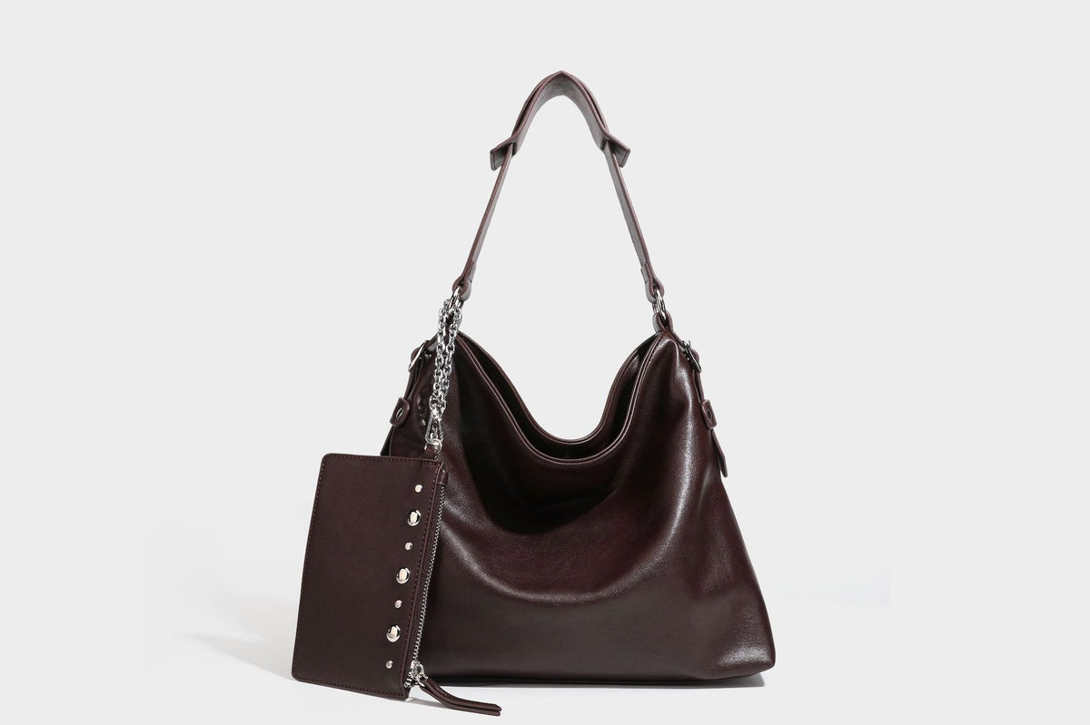 Large slouchy hobo shoulder bag in dark brown with smooth leather-look finish, adjustable strap, and silver-tone hardware