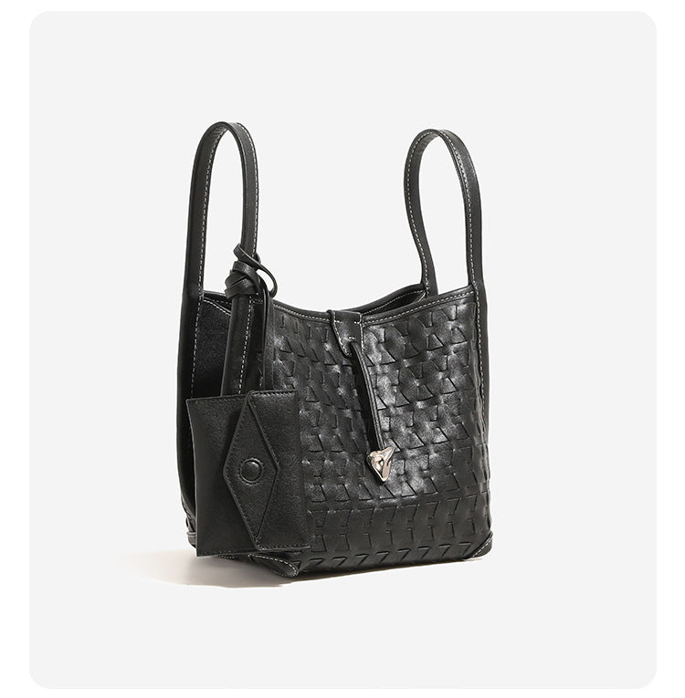 Woven embossed leather-look bucket bag with triangular texture pattern, gold-tone hardware, and attached mini snap pouch