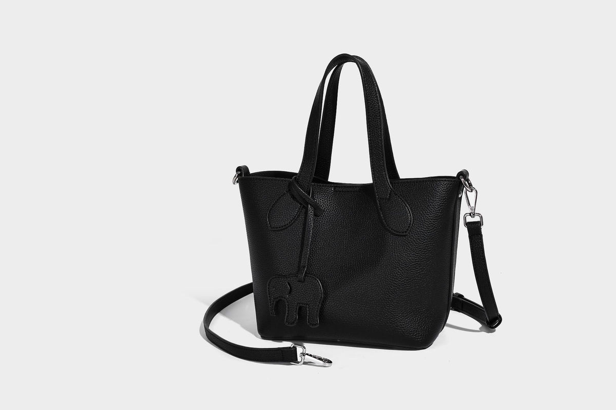 Compact pebbled bucket tote bag with elephant charm, twin top handles, and detachable crossbody strap, detail view 25