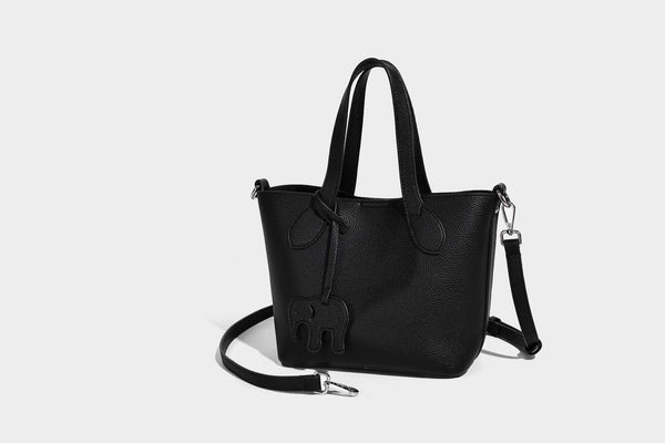 Compact pebbled bucket tote bag with elephant charm, twin top handles, and detachable crossbody strap, detail view 25