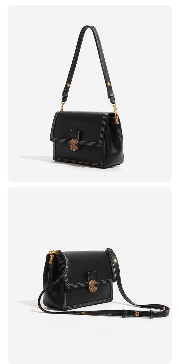 Structured flap shoulder bag with gold-tone circular turn-lock closure, white contrast stitching, and adjustable strap
