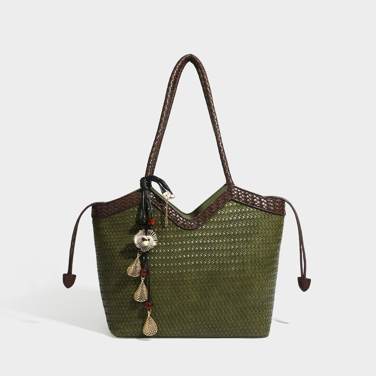 Woven tote bag with braided shoulder straps, drawstring closure, and dangling metal-and-bead charm, detail view 7