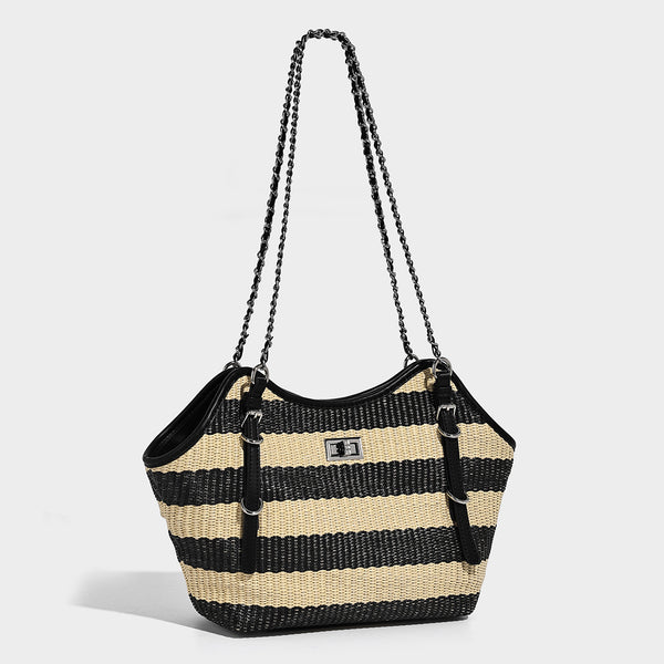 Black and natural striped woven tote bag with chain shoulder strap and silver-tone turn-lock hardware, detail view 3