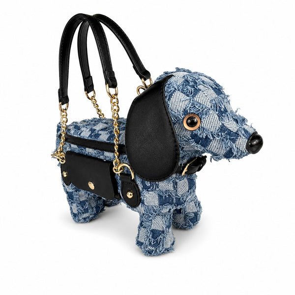 Dachshund-shaped frayed denim patchwork crossbody bag with black leather-look ear, gold-tone chain strap, and front, detail