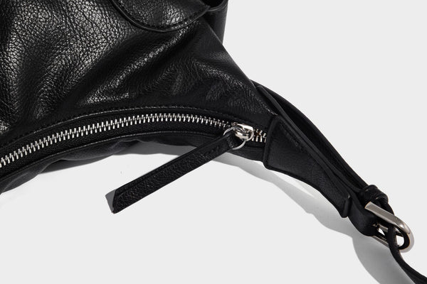 Soft pebbled leather-look hobo shoulder bag with zip top closure, side flap pockets, and silver-tone hardware, detail view 21