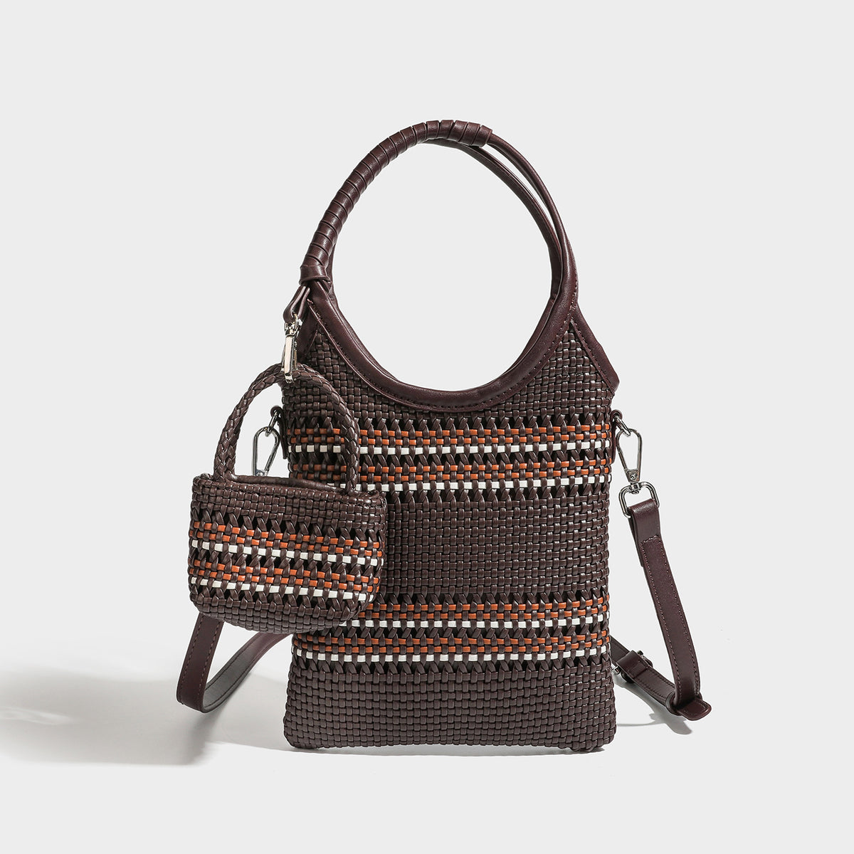 Brown two-tone woven leather-look shoulder bag with braided top handles, detachable mini pouch, and adjustable crossbody