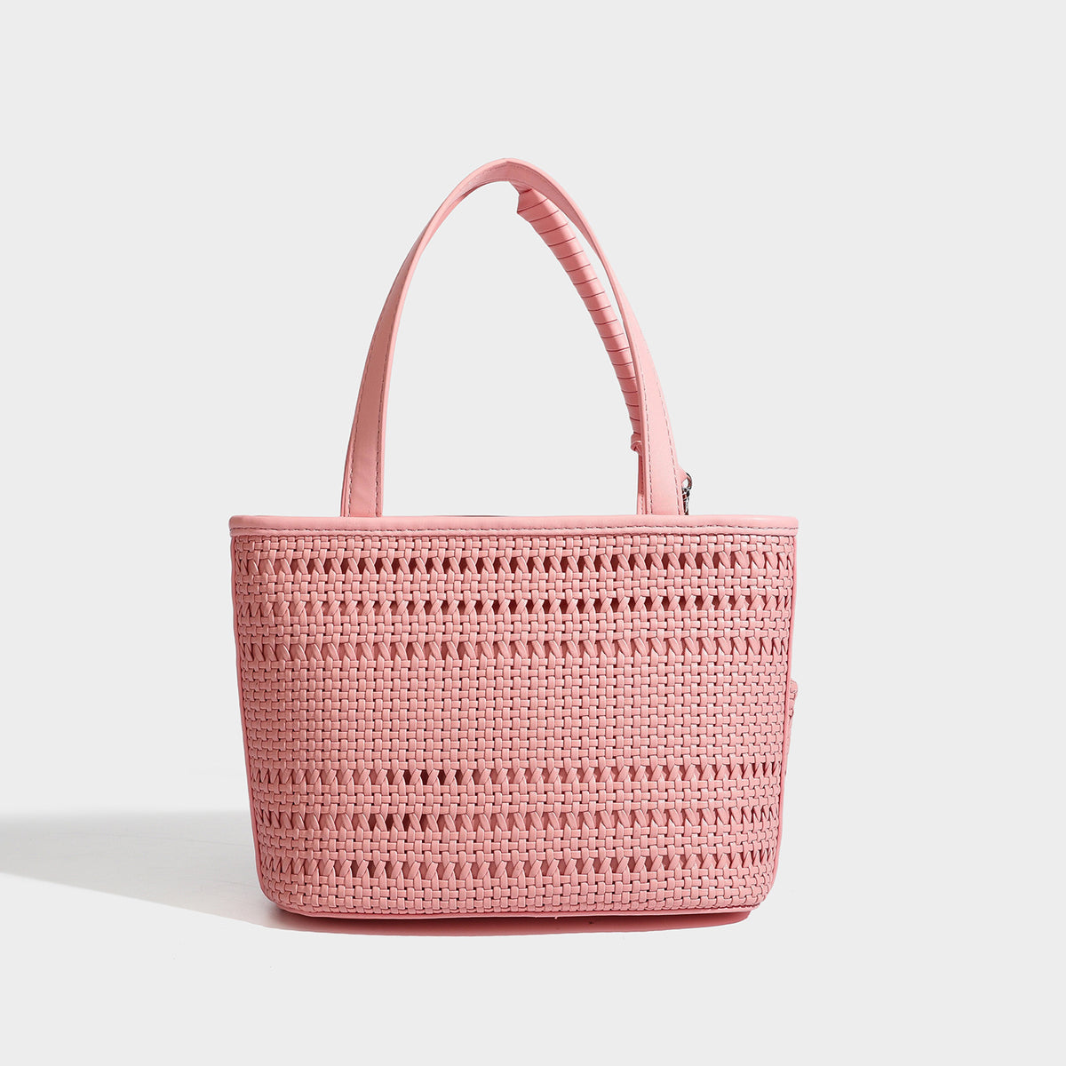 Structured open-weave tote bag with smooth leather-look trim, double top handles, detachable crossbody strap, and mini zip