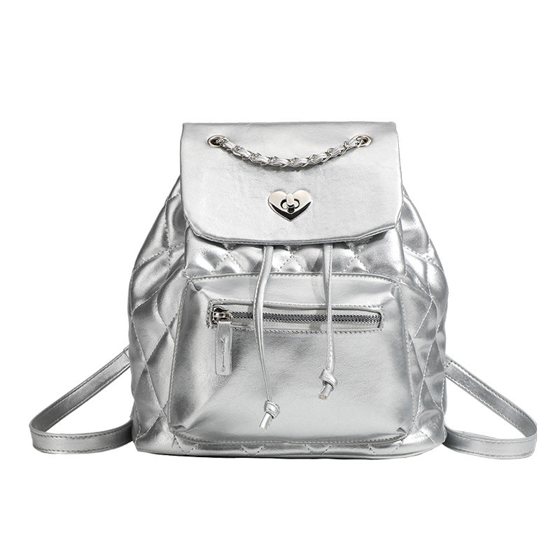 Quilted leather-look backpack with heart turn-lock clasp and woven chain handles, detail view 5