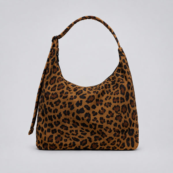 Multicolor plaid and star print hobo shoulder bag with knotted strap and silver-tone zip closure, detail view 8