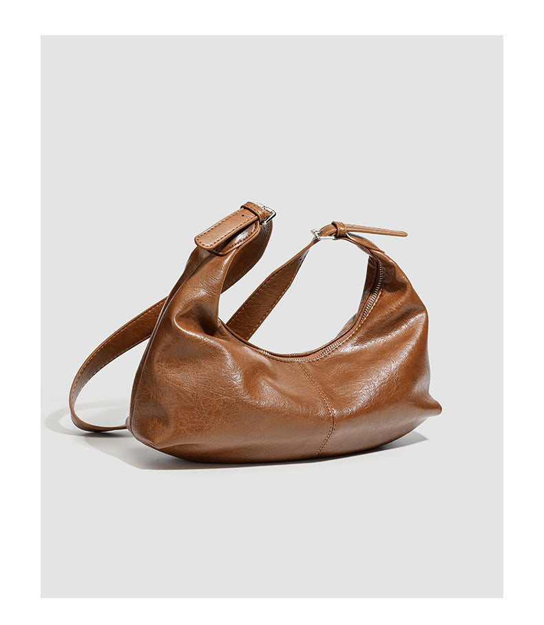 Slouchy crescent hobo shoulder bag with zip-top closure and adjustable strap, detail view 15