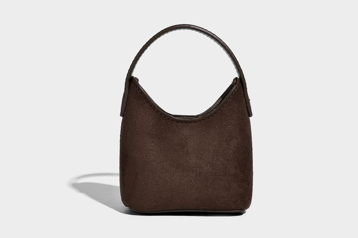 Dark brown suede-look hobo shoulder bag with top zip closure, adjustable strap, and small detachable mini pouch, detail view