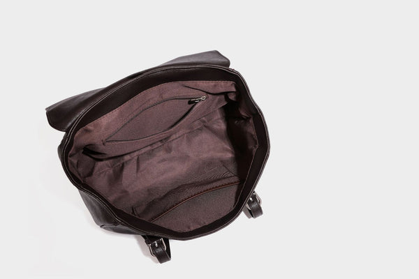 Large structured vintage-style tote bag with flap-front turn-lock closure, twin buckle straps, and double shoulder handles