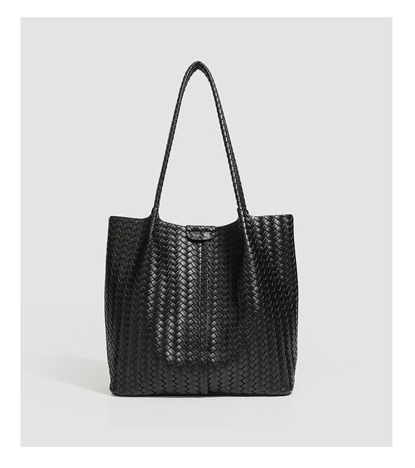 Large black basket-weave leather-look tote bag with long braided shoulder straps and matching woven zip pouch, detail view 15