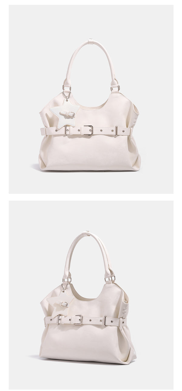 Large soft hobo shoulder bag with glossy textured finish, decorative belt buckle, star charm, and silver-tone hardware