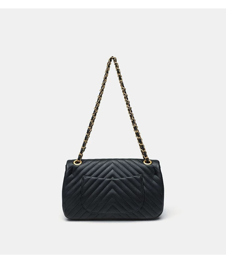 Structured quilted flap bag with gold-tone chain strap and turn-lock closure, detail view 13