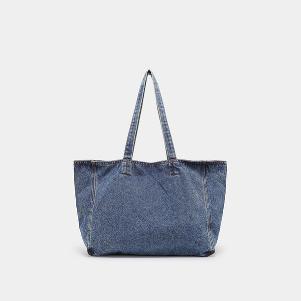 Große Tote Bag aus verwaschenem blauem Denim mit Grafikprint im handschriftlichen Stil, orangefarbenen Kontrastnähten und langem Stoffschulterriemen