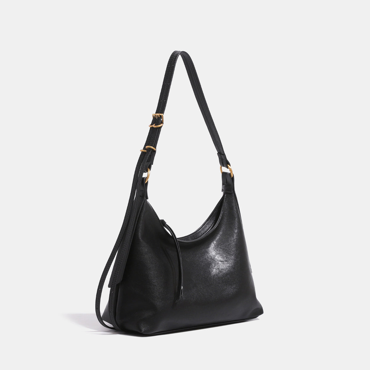 Slouchy hobo shoulder bag in smooth leather-look finish with gold-tone hardware and adjustable strap, detail view 3