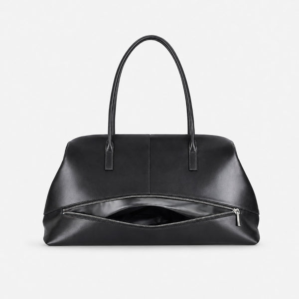 Large structured black Boston tote bag with double shoulder handles and full-length front zipper compartment, detail view 17