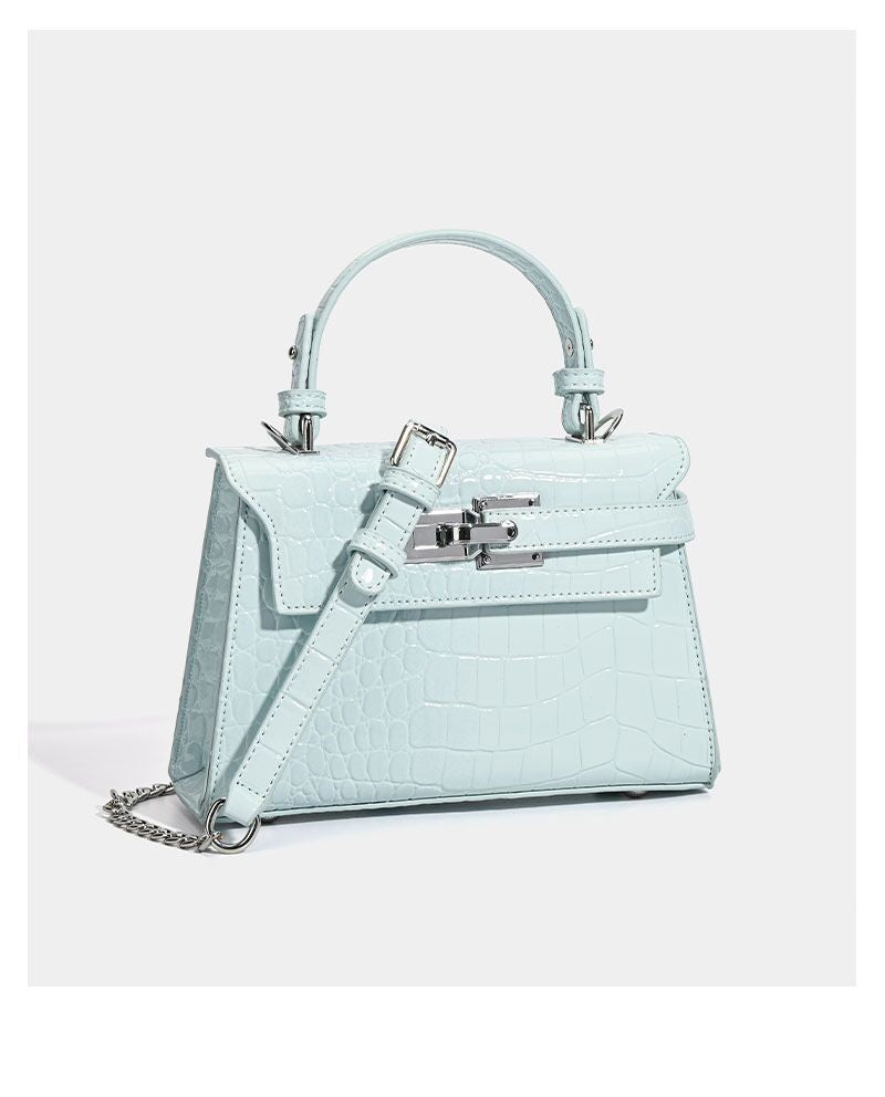 Croc-embossed mini top-handle satchel with silver turn-lock closure and adjustable crossbody strap, detail view 18