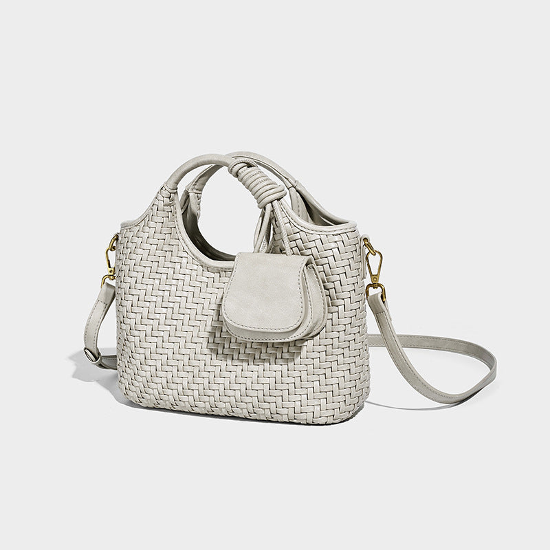 Woven texture tote bag with knotted top handles, attached front mini pouch, and gold-tone hardware, detail view 8