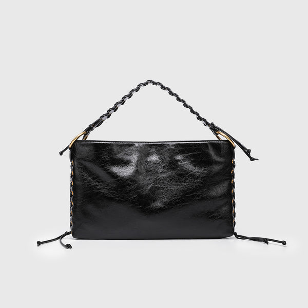 Large slouchy hobo shoulder bag with braided top handle, gold-tone O-ring hardware, and lace-up side cord detailing in